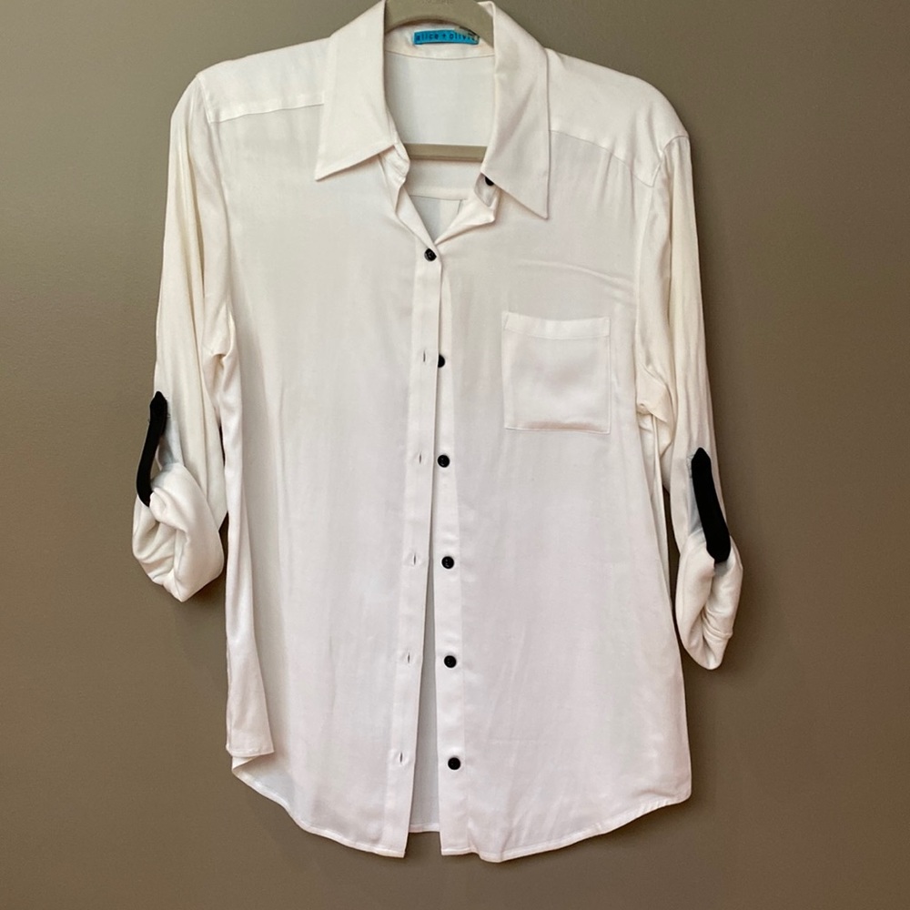 Alice + Olivia cream blouse.  Black Leather tabs for up rolled up sleeves.